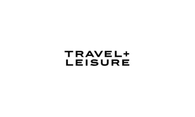 Travel + leisure logo in black text on a transparent background.