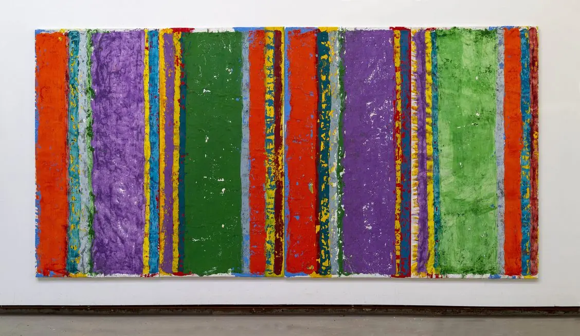 Large abstract painting featuring vertical textured stripes in vivid green, purple, red, and blue.